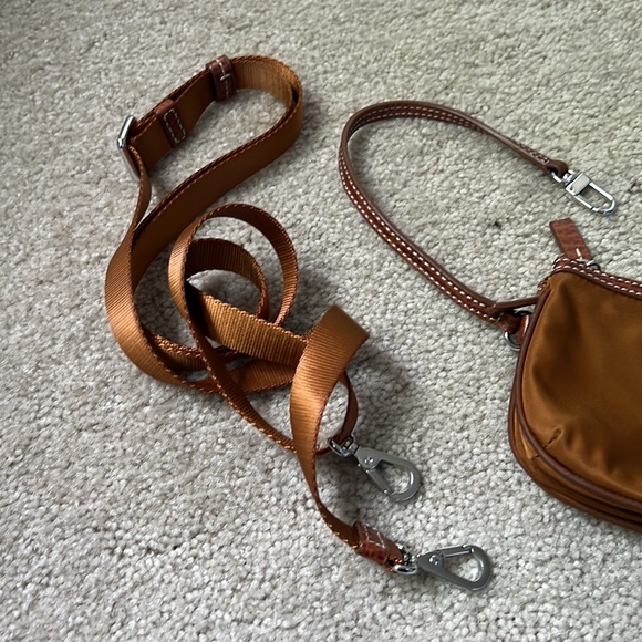 Tumi wristlet with crossbody strap. - Picture 4 of 8